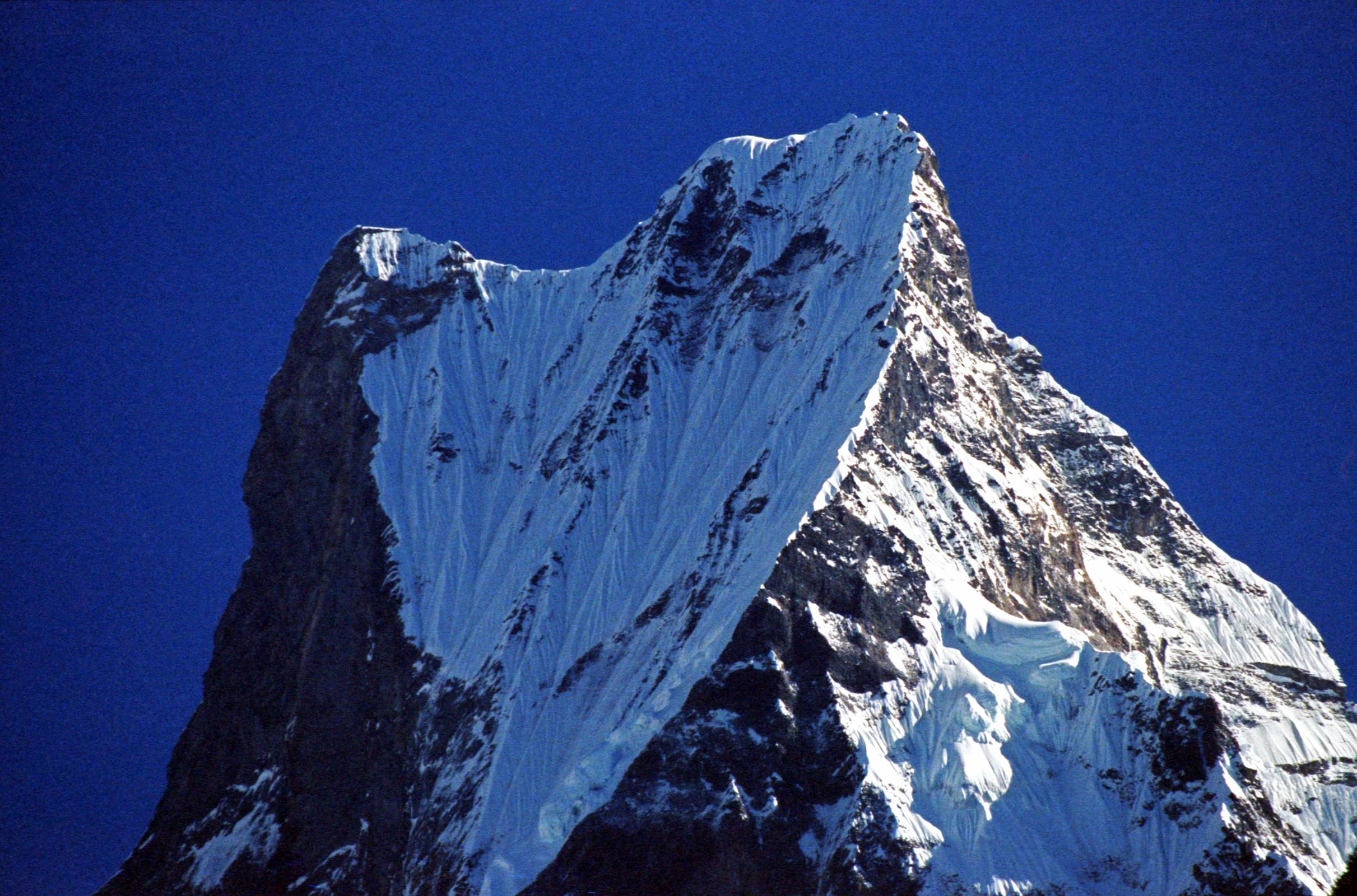 106 Machapuchare Close Up From Modi Khola Valley Here is a close up of Machapuchare at the head of the Modi Khola valley in the morning light.